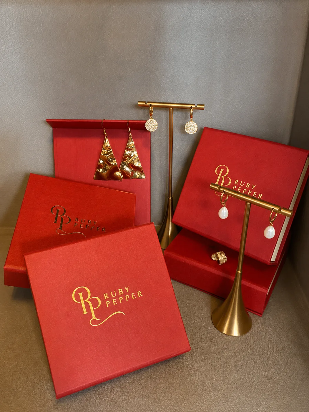 Luxury Ruby Pepper gifting hamper with ruby velvet pouches and gold-trimmed jewellery boxes